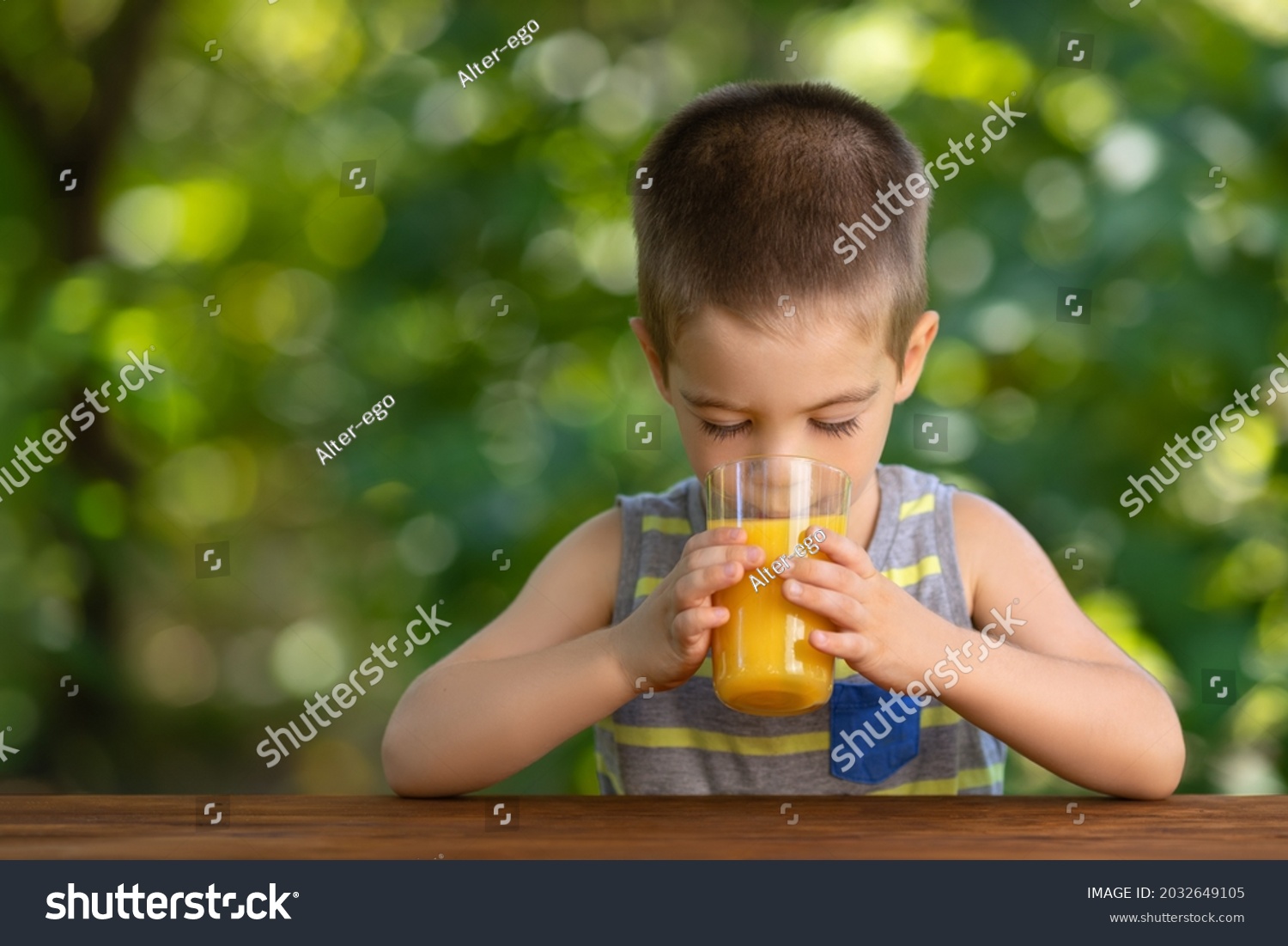 Little Boy Drinking Orange Juice Glass Stock Photo 2032649105 ...