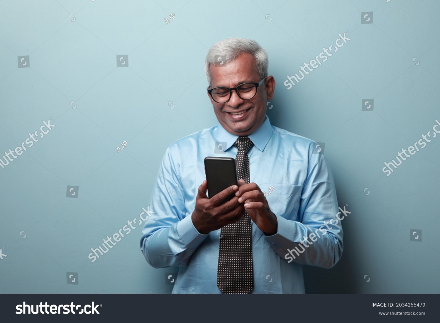 Smiling Businessman Indian Ethnicity Looking His Stock Photo 2034255479 ...