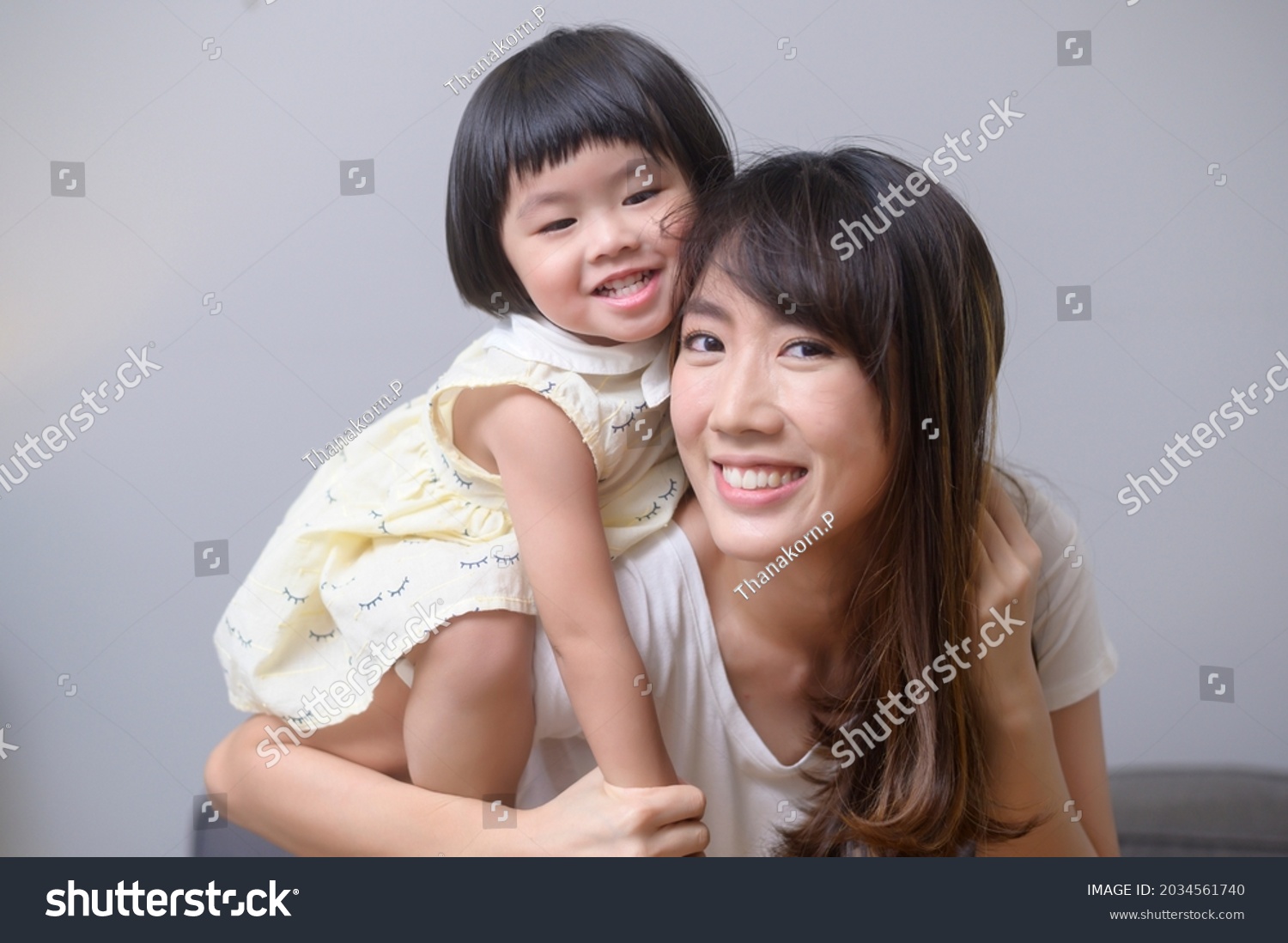 Portrait Happy Asian Mom Daughter Stock Photo 2034561740 | Shutterstock