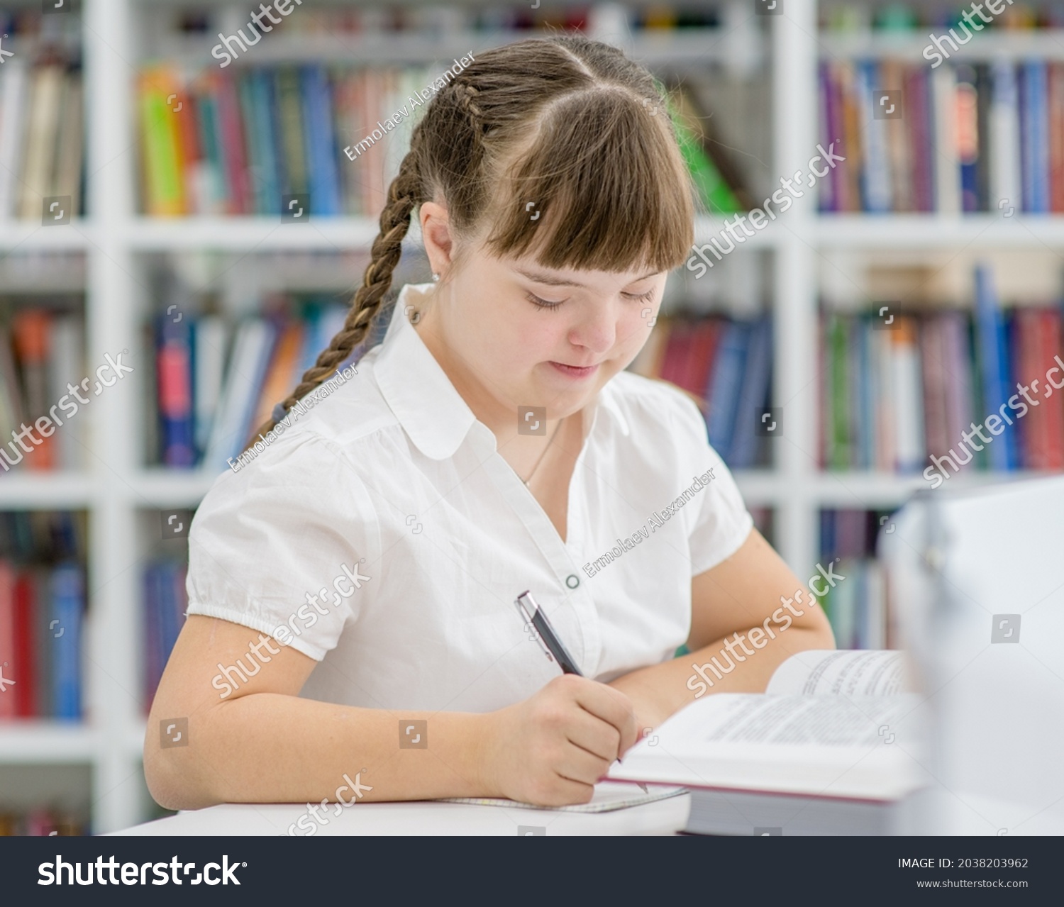 Young Girl Down Syndrome Doing Homework Stock Photo 2038203962 ...