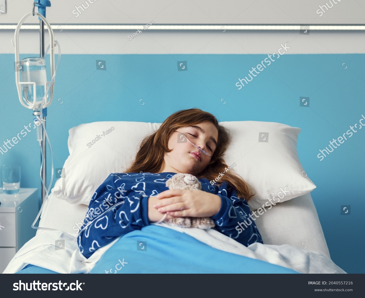 Sick Child Lying Hospital Bed Holding Stock Photo 2040557216 | Shutterstock