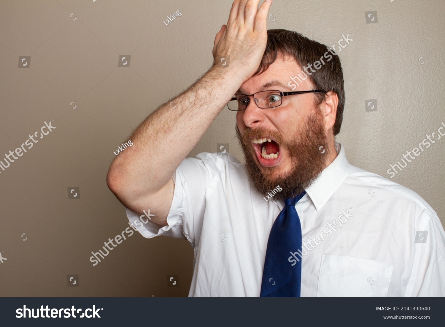 Man Smacking His Head His Hand Stock Photo 2041390640 Shutterstock