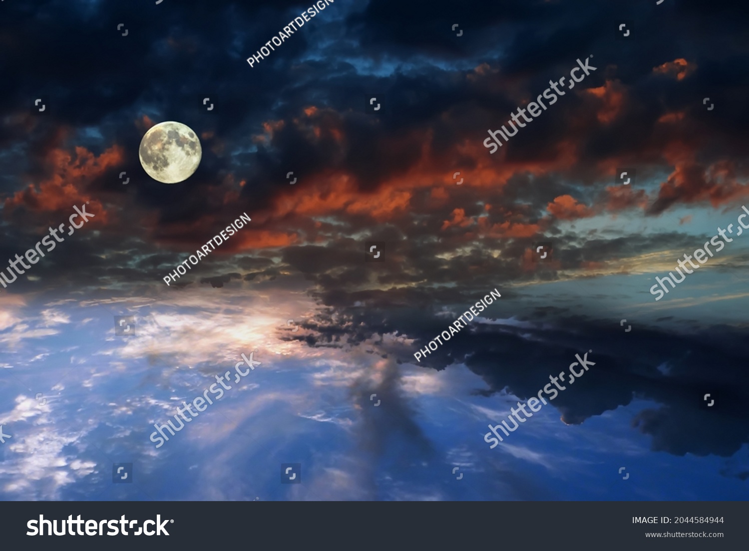 Full Moon On Dramatic Fluffy Clouds Stock Photo 2044584944 | Shutterstock