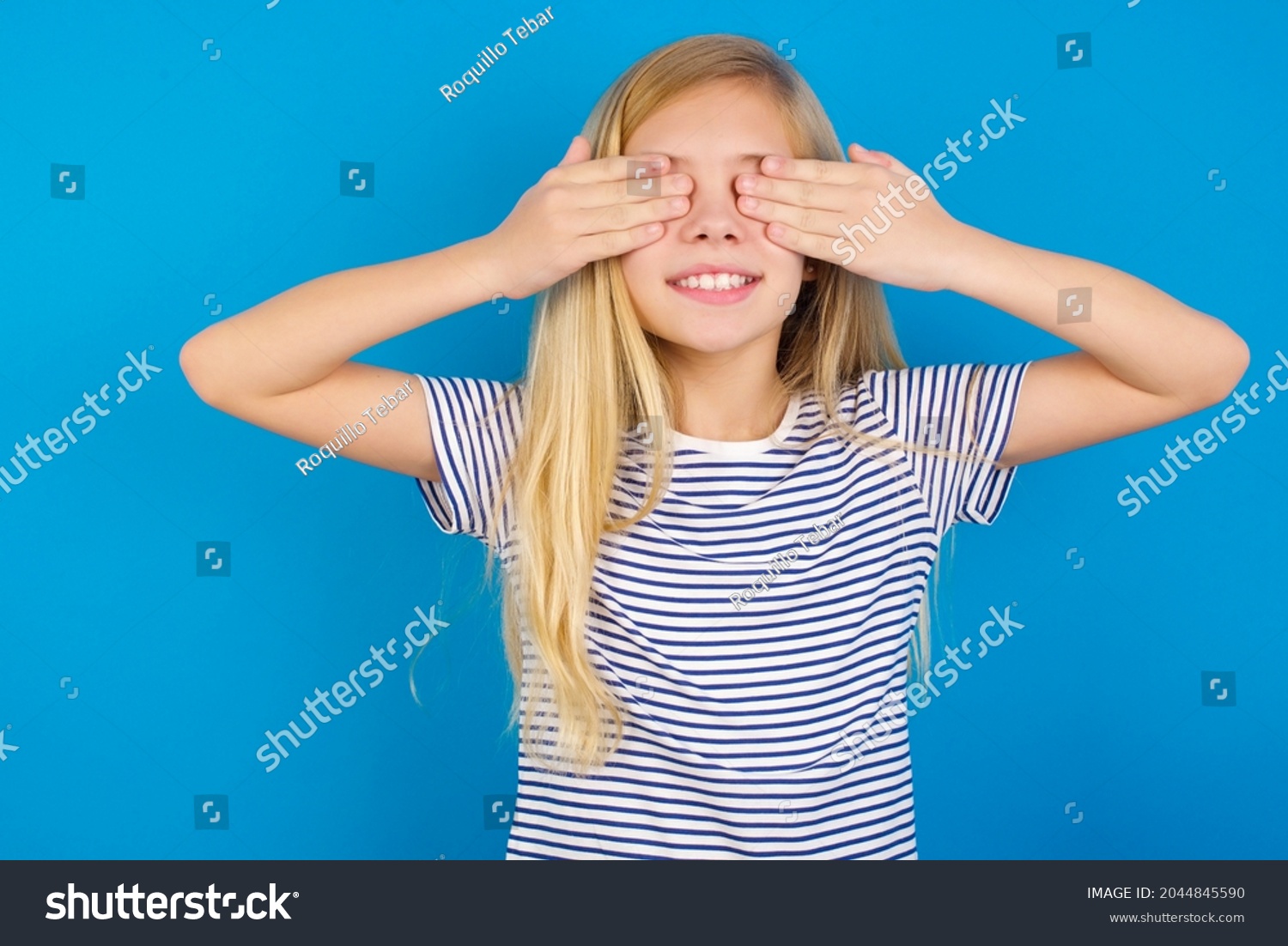 Caucasian Blonde Kid Girl Wearing Stripped Stock Photo 2044845590 ...