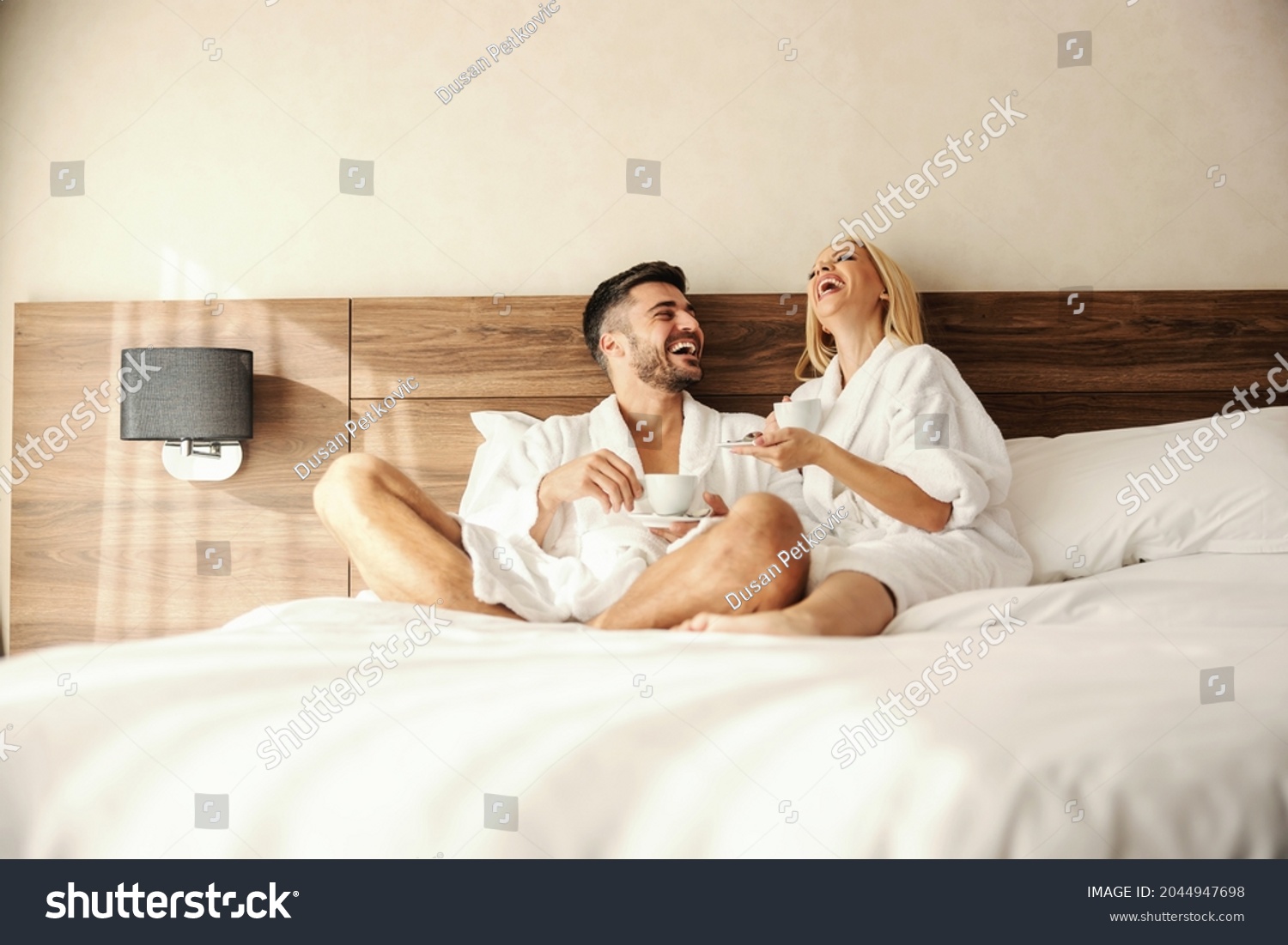 romantic hotel room couple photos