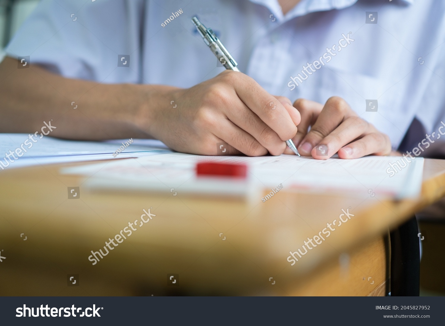 Writing Test Exam Asian Students Concentrate Stock Photo 2045827952