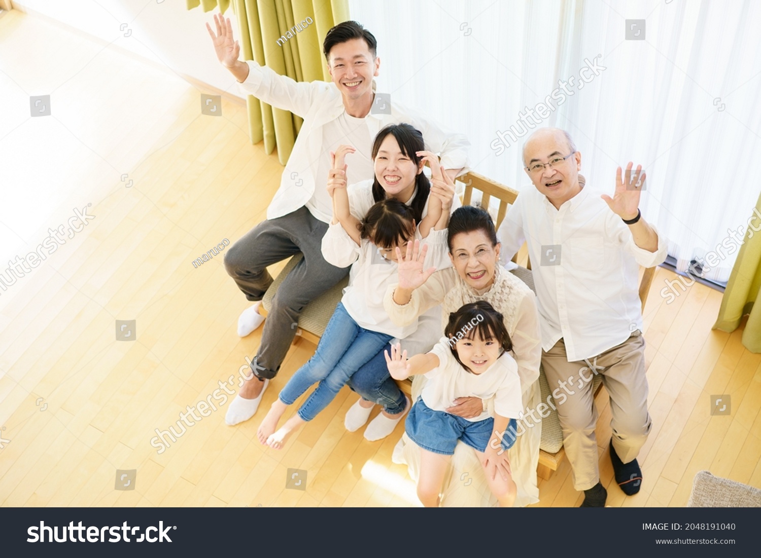 3 Generation Family Sitting On Couch Stock Photo 2048191040 Shutterstock   Stock Photo  Generation Family Sitting On The Couch 2048191040 