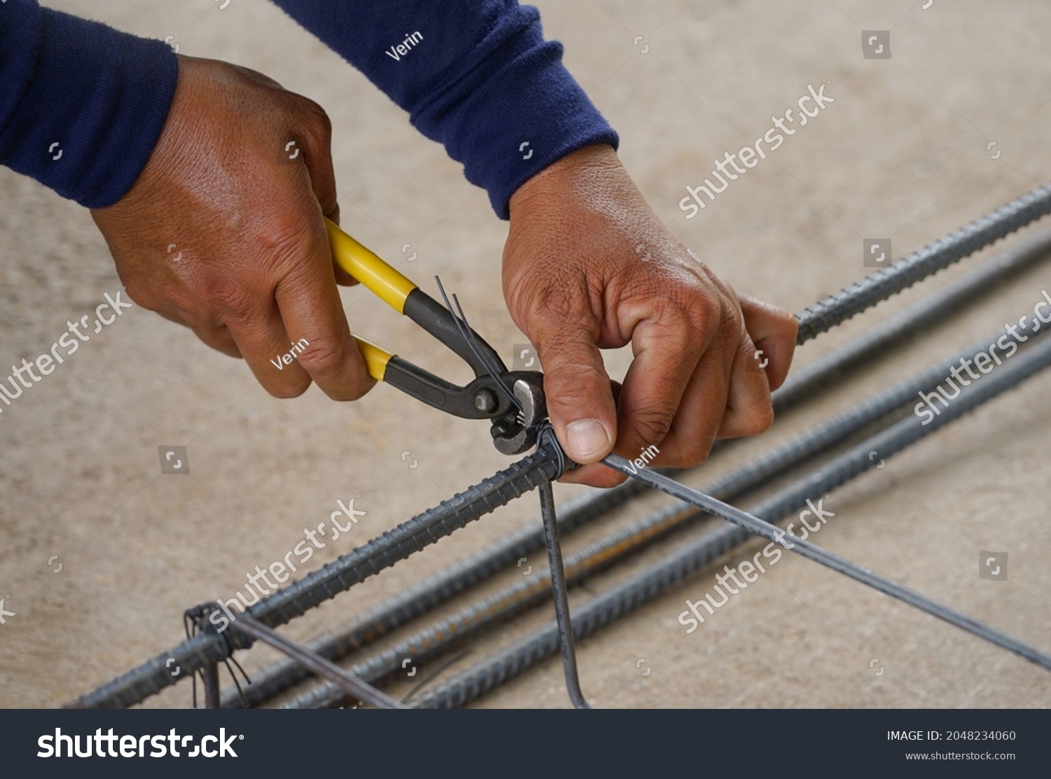 Workers Hand Tying Reinforcing Steel Bars Stock Photo 2048234060 ...