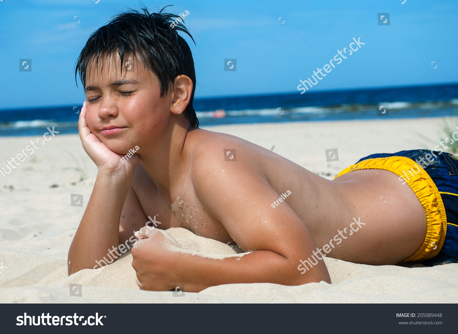 Boy Lying On Beach Stock Photo 205089448 Shutterstock.