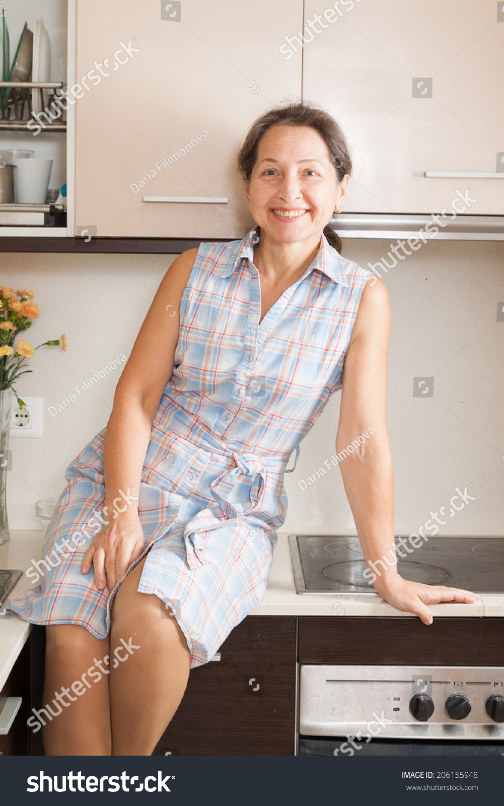 Mature Housewife Sitting Domestic