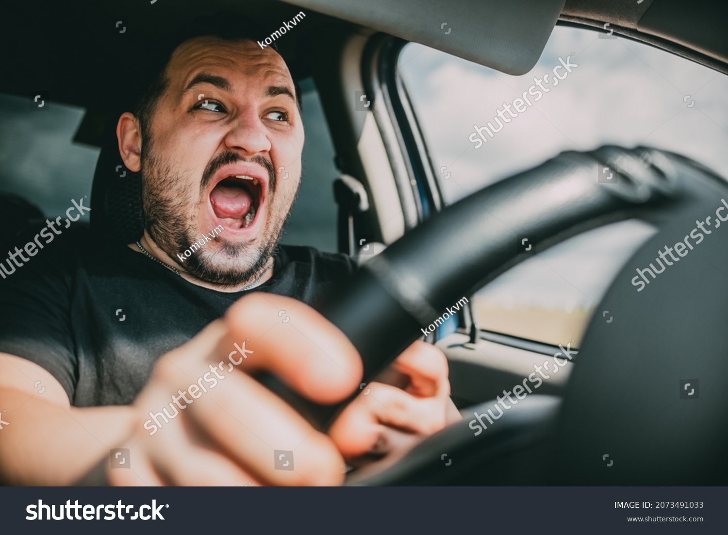 Young Man Driving Car Shock Screams Stock Photo 2073491033 | Shutterstock