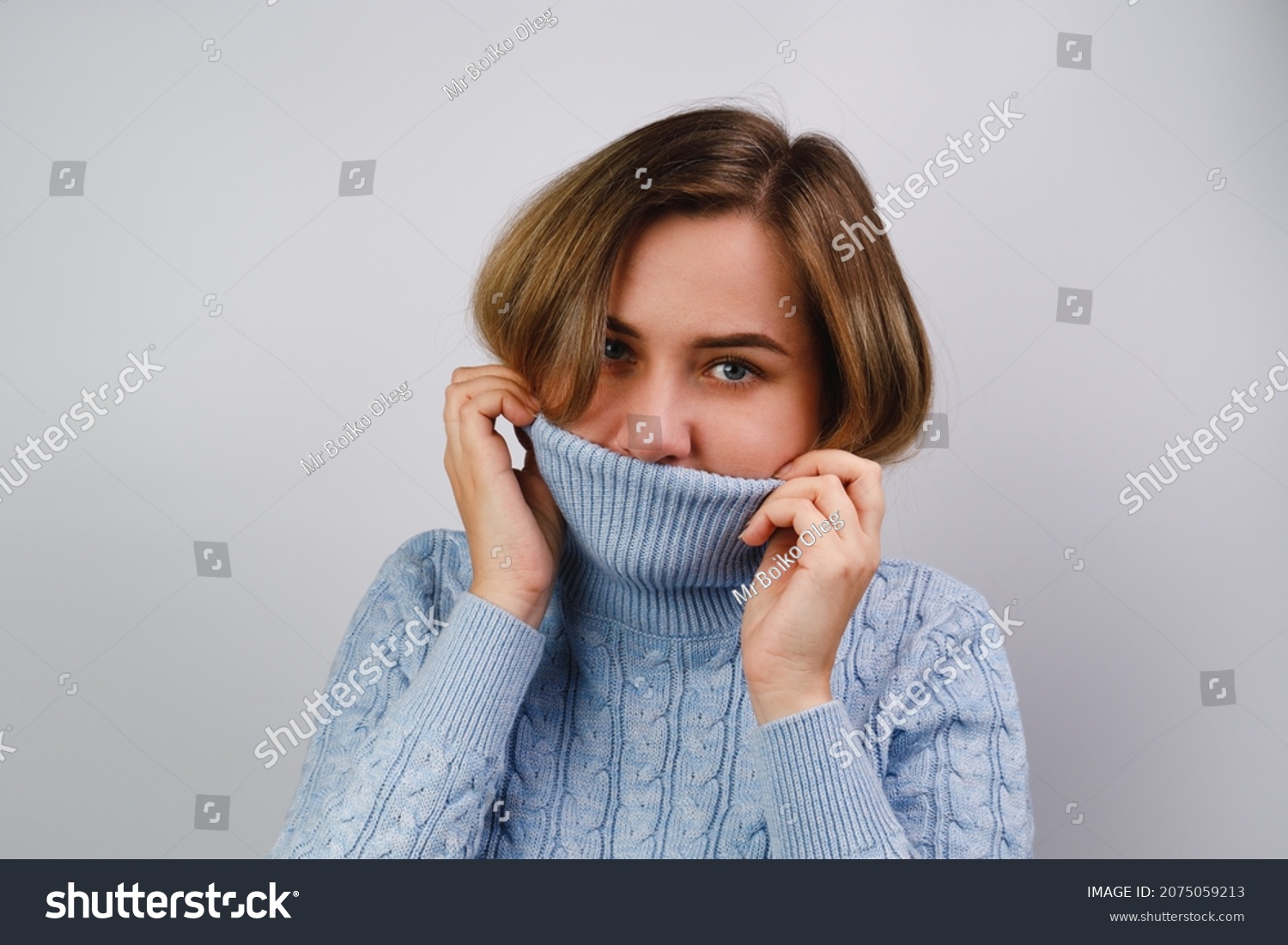 Portrait Girl Pulling Her Sweater Over Stock Photo 2075059213 ...