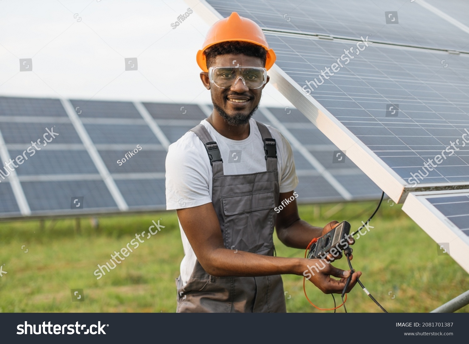 Professional Technician Uniform Using Multimeter While Stock Photo ...