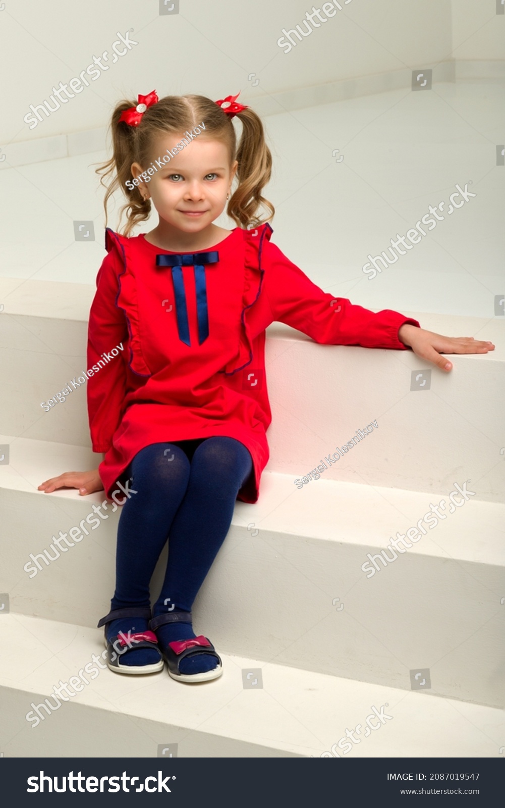 Cute Blonde Little Girl Sitting On Stock Photo 2087019547 | Shutterstock