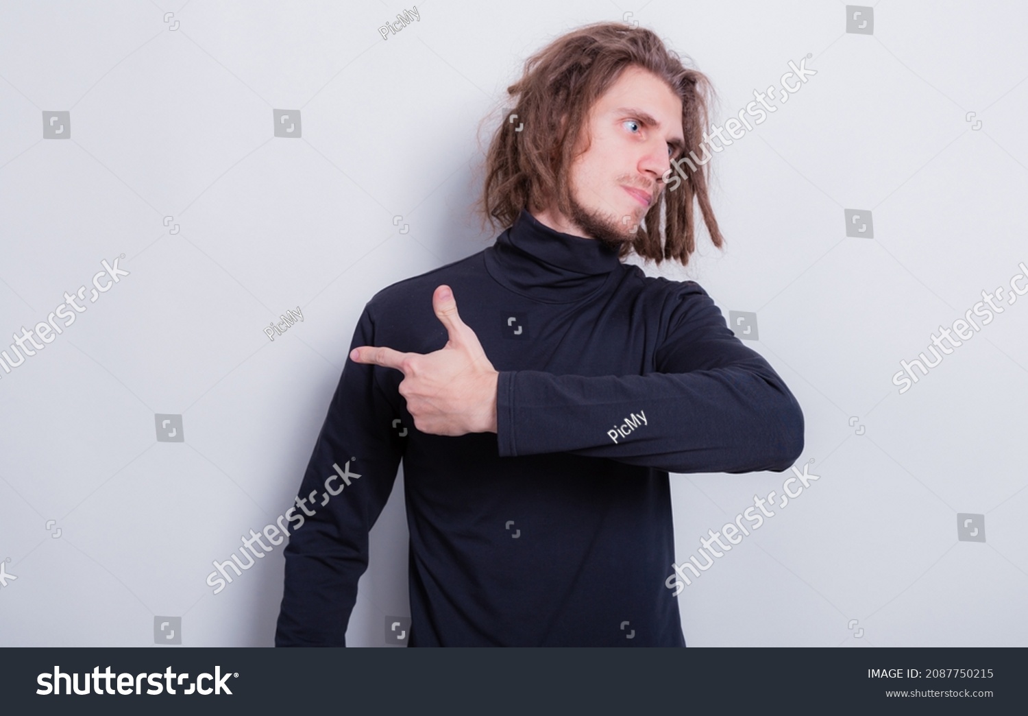 Young Man Pointing Show Direction Man Stock Photo 2087750215 | Shutterstock