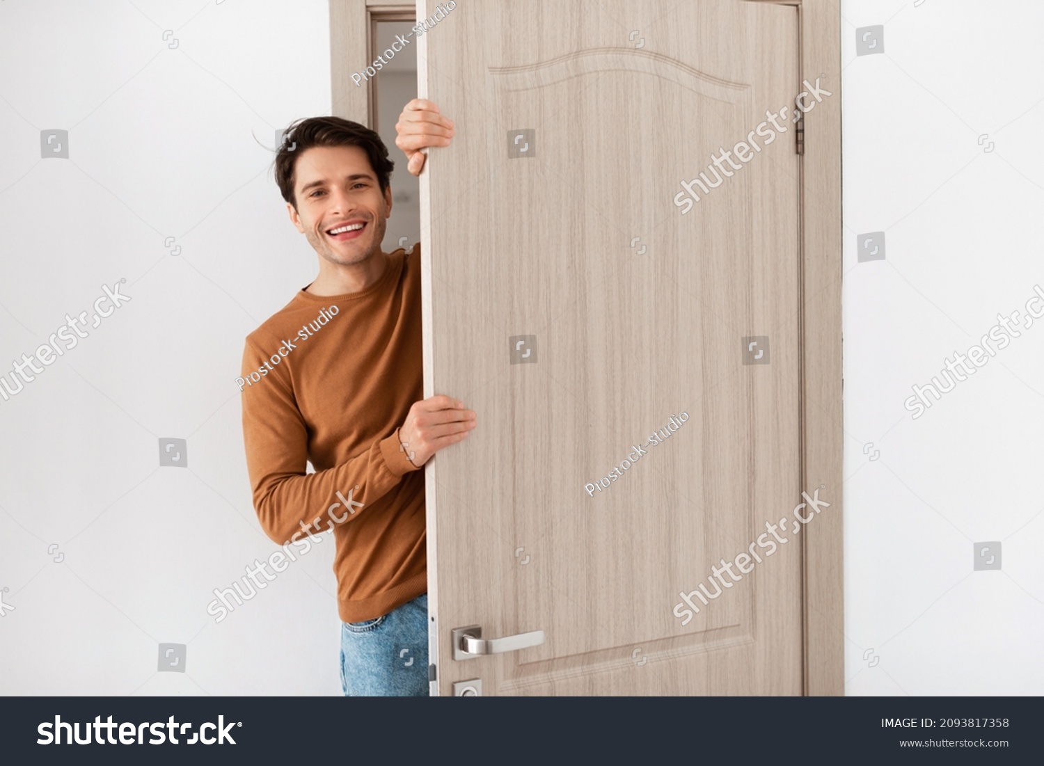 452 Man peeking door Stock Photos, Images & Photography | Shutterstock