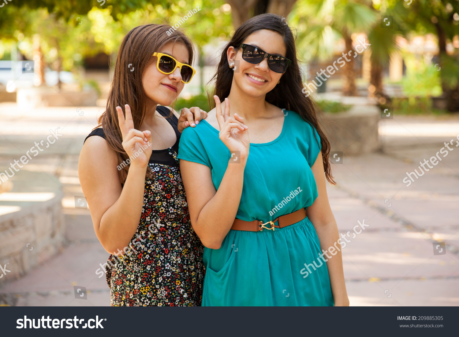 Beautiful Teens Making Peace Sign While Stock Photo 209885305 ...