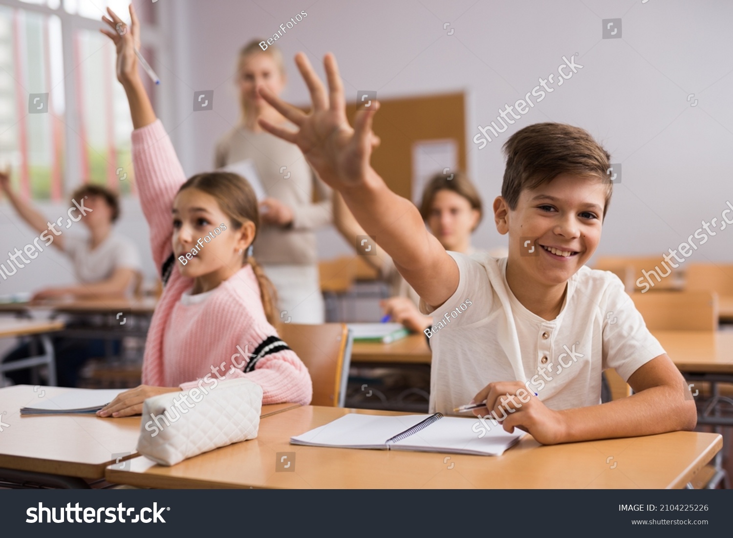 Group Happy School Pupils Raise Their Stock Photo 2104225226 | Shutterstock