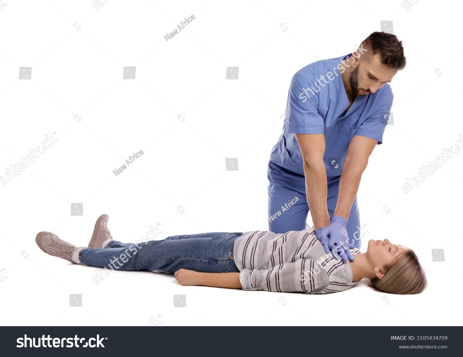 Doctor Uniform Performing First Aid On Stock Photo 2105434709 ...