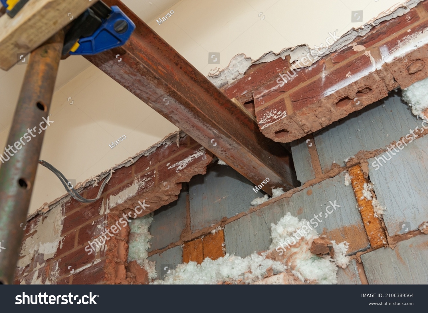 Is This Legit Or Is Compromising A Load Bearing Wall R DIYUK   Stock Photo Using Acrow Props And Steel Needles To Support A Load Bearing Block Wall Steel Beam Installation 2106389564 