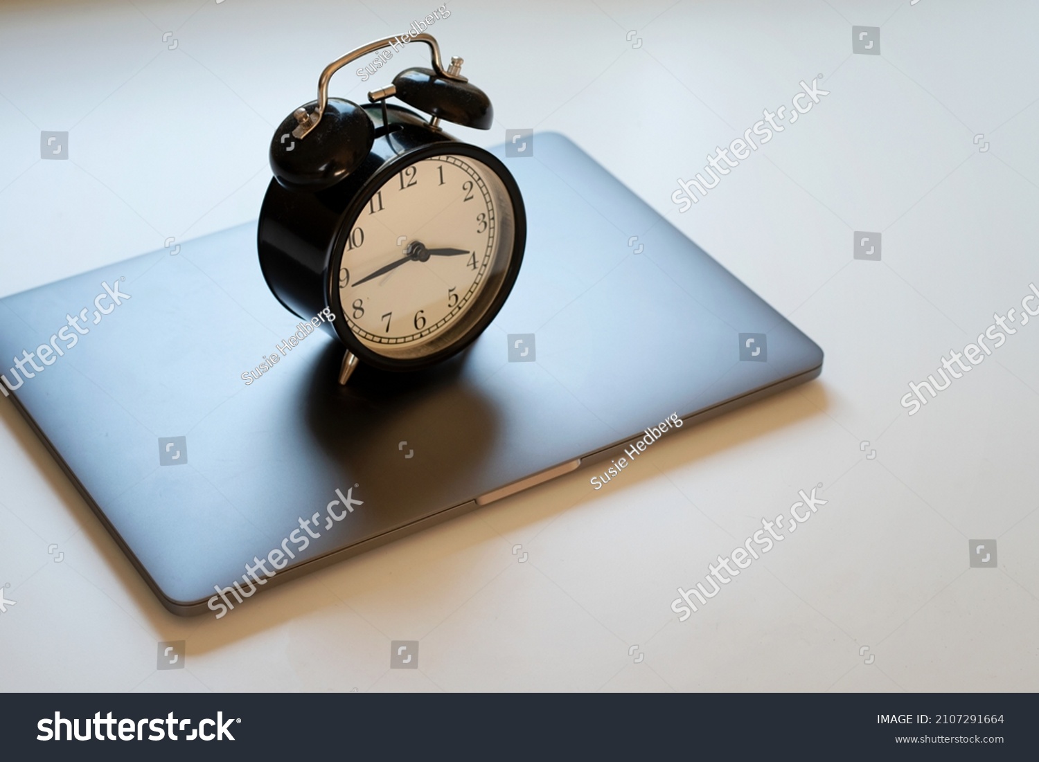 Alarm Clock Standing On Laptop Concept Stock Photo 2107291664 ...