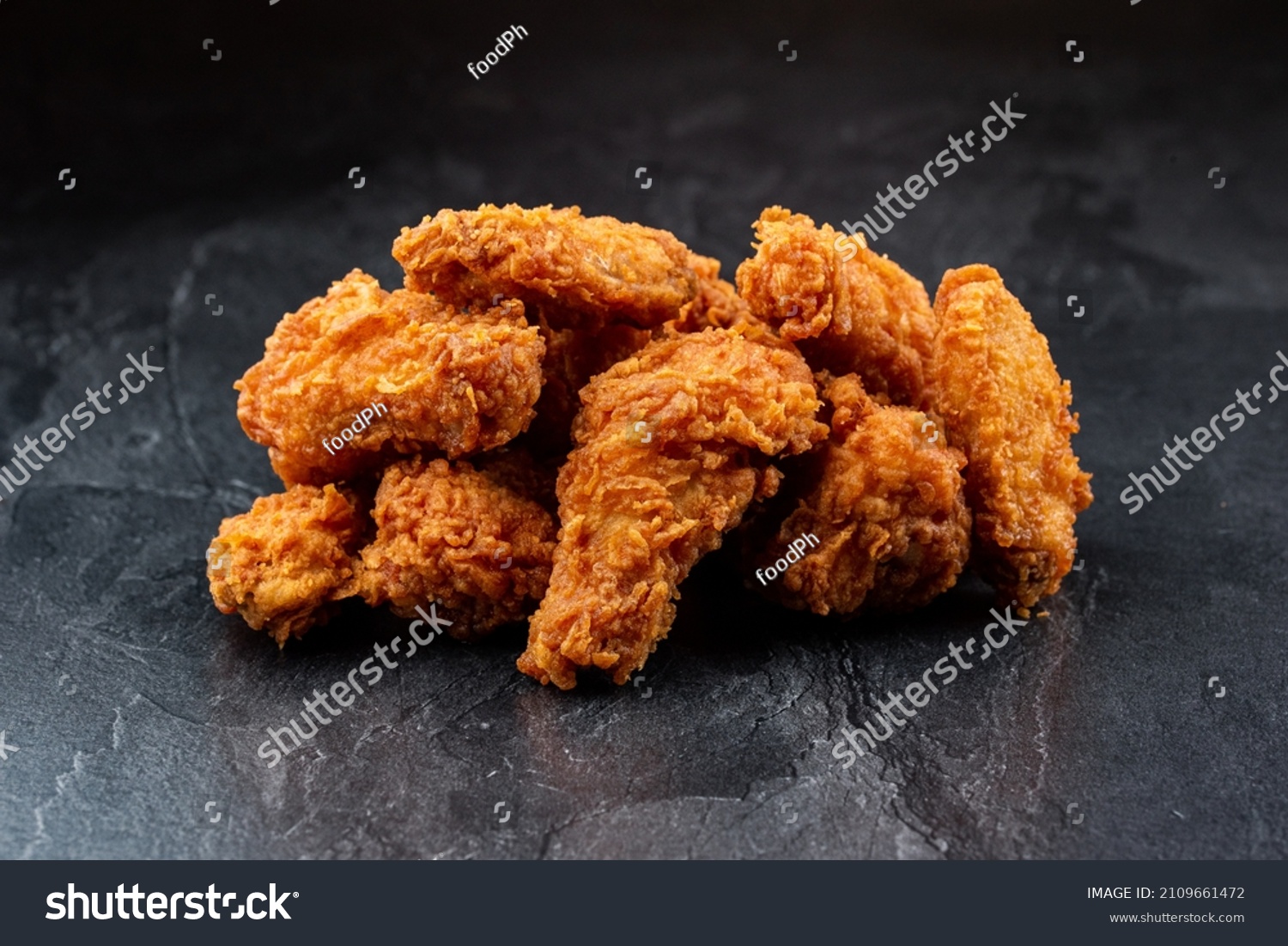 Fried Chicken Nuggets On Black Background Stock Photo 2109661472 ...