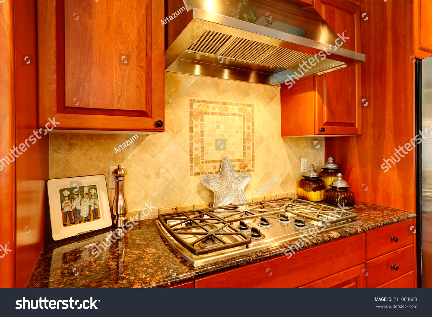 Kitchen Cabinet Granite Top Builtin Stove Stock Photo 211064683   Stock Photo Kitchen Cabinet With Granite Top And Built In Stove View Of Tile Back Splash Trim 211064683 