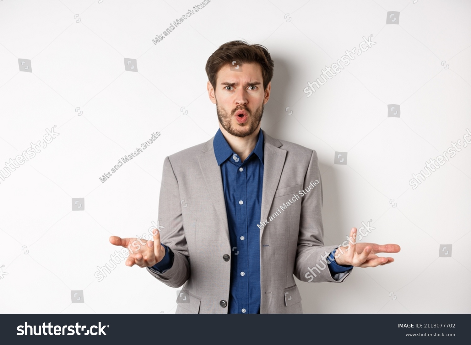 Confused Shocked Businessman Raising Hands Asking Stock Photo ...