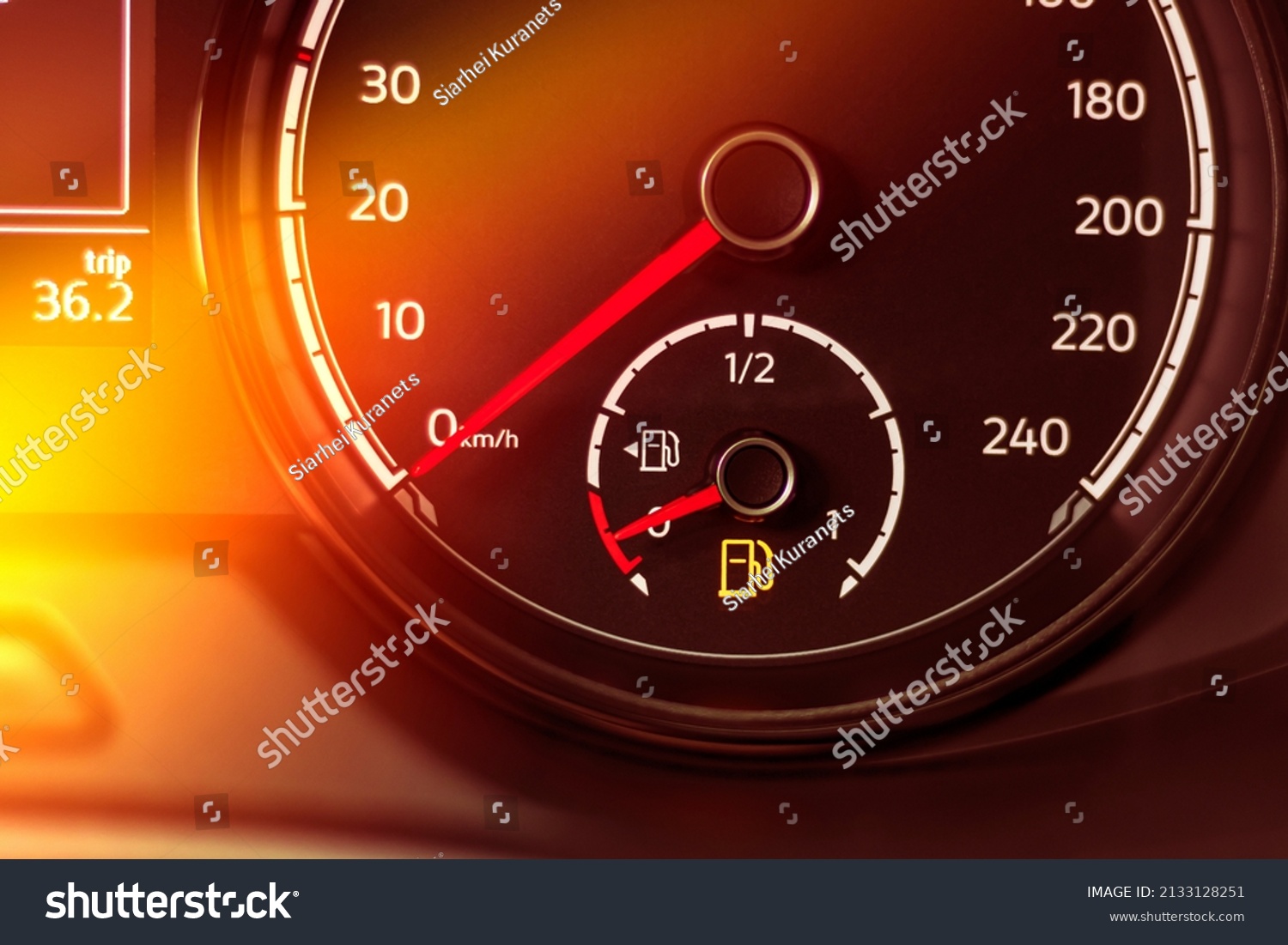 fuel-discharge-warning-light-on-dashboard-stock-photo-2133128251