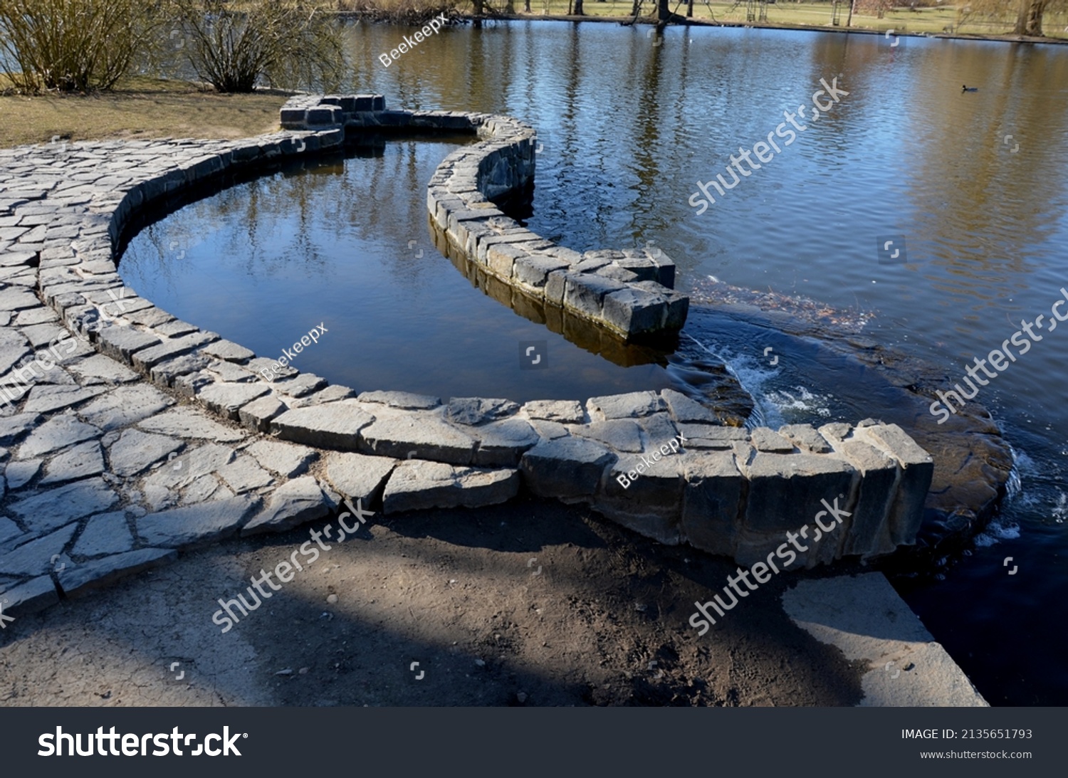 1 795 Dock On Small Pond Images Stock Photos Vectors Shutterstock   Stock Photo The Tributary To The Pond Is Slowed Down In A Cobbled Small Pond Which Serves As A Paddling Pool 2135651793 