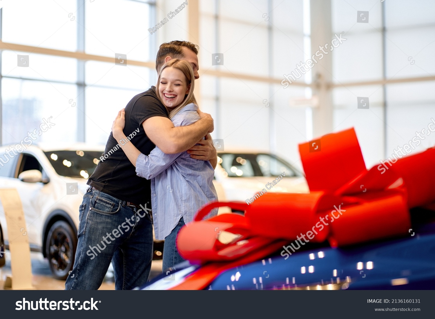 Male Shows New Car Girlfriend Present Stock Photo 2136160131 Shutterstock   Stock Photo Male Shows New Car To Girlfriend Present Concept Hugging Automobile Salon Make A Decision Gift 2136160131 