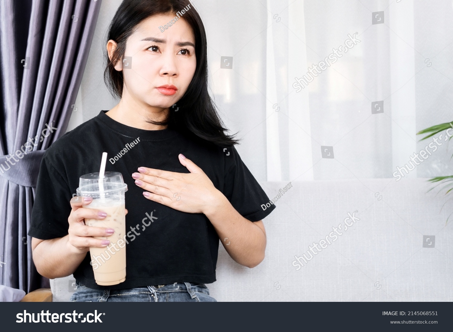 asian-woman-have-problem-heart-beats-stock-photo-2145068551-shutterstock