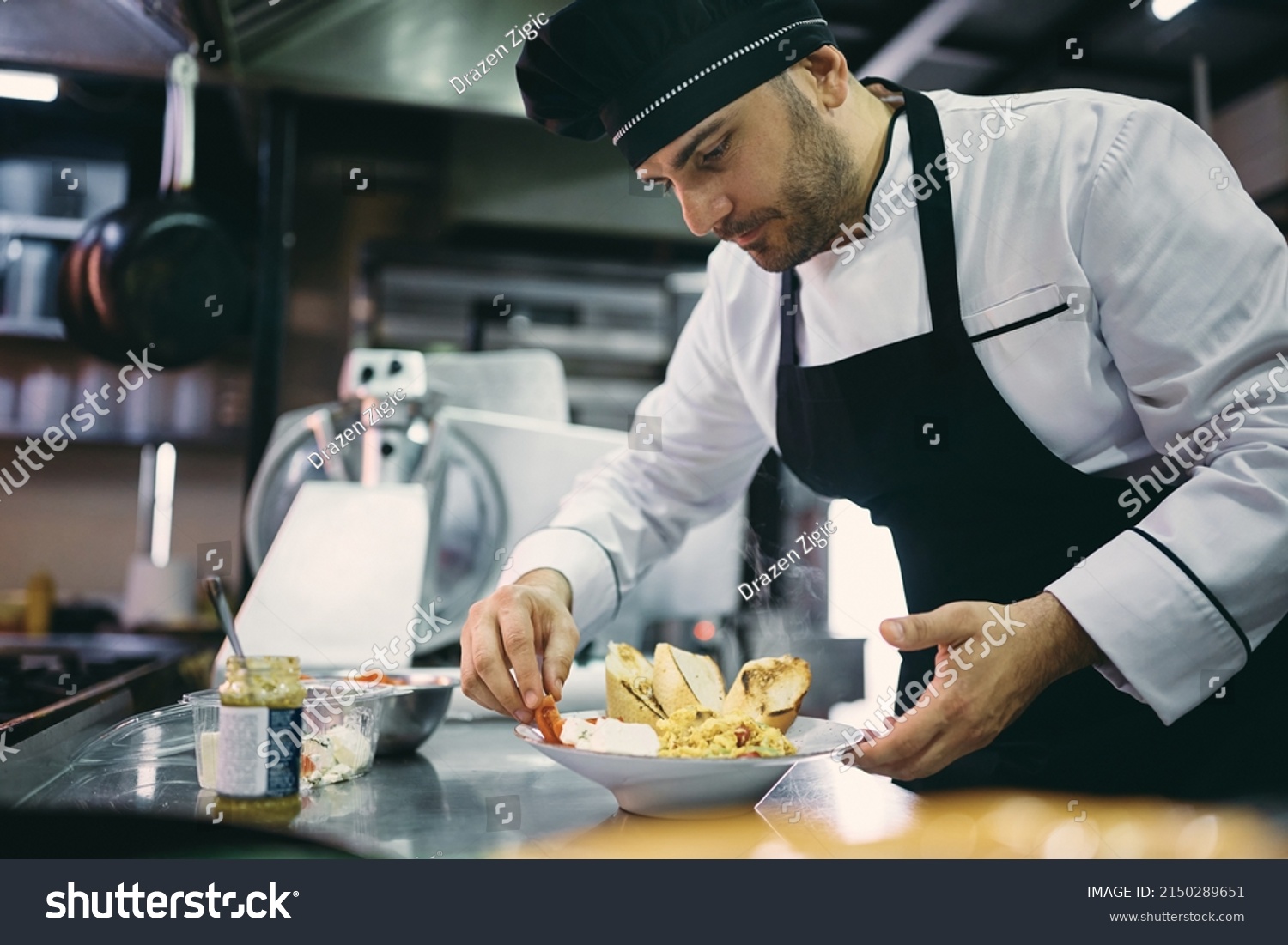 Professional Cook Serving Meal While Working Stock Photo 2150289651 ...