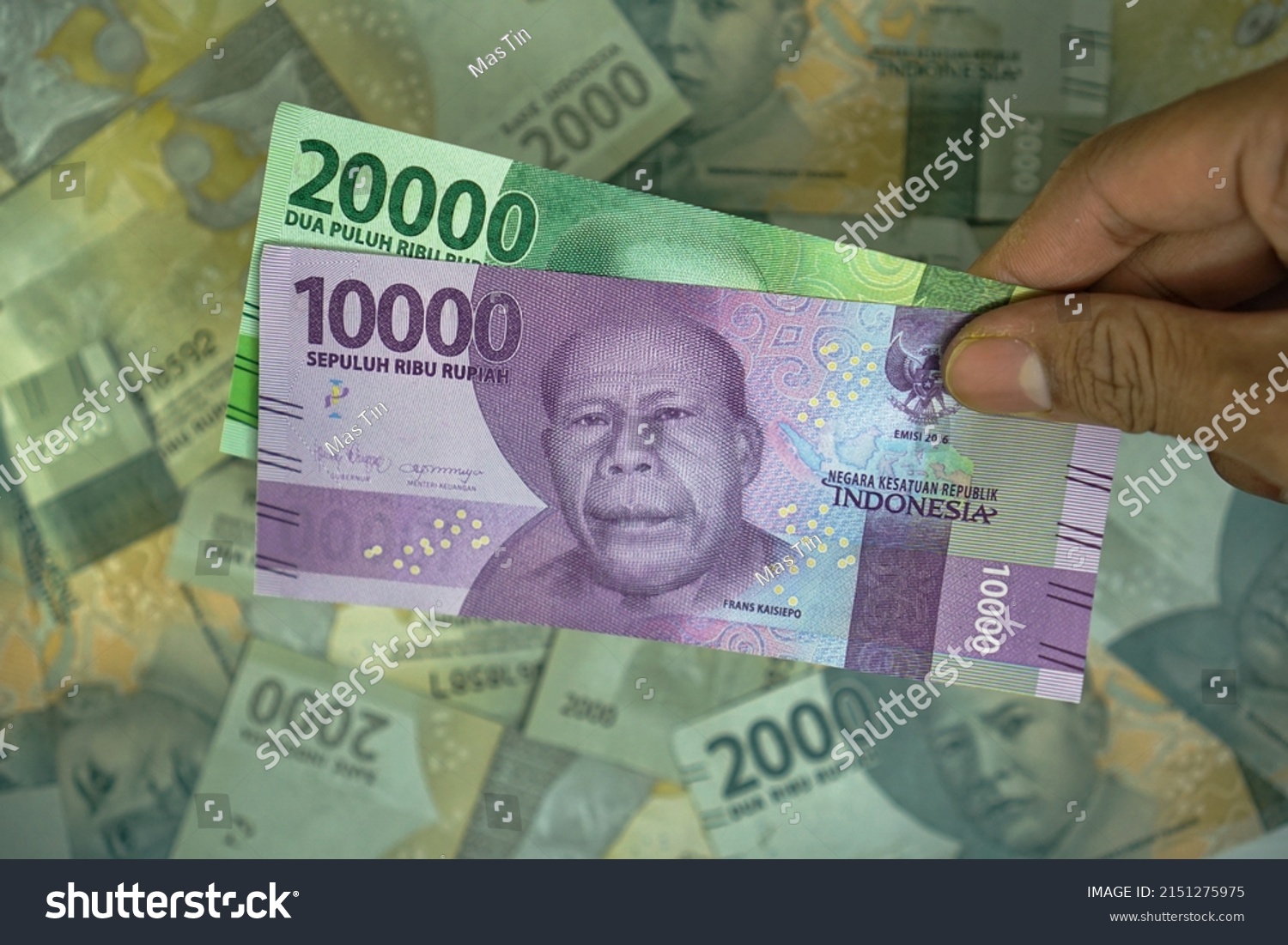 10000 20000 Idr Indonesian Rupiah Money Stock Photo 2151275975   Stock Photo  Idr Indonesian Rupiah Money Concept By Was Held By Businessman On Money Background 2151275975 