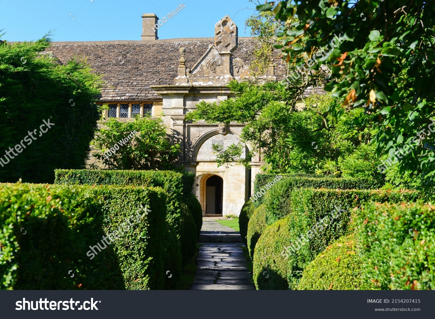 view-garden-path-stone-archway-beautiful-stock-photo-2154207415