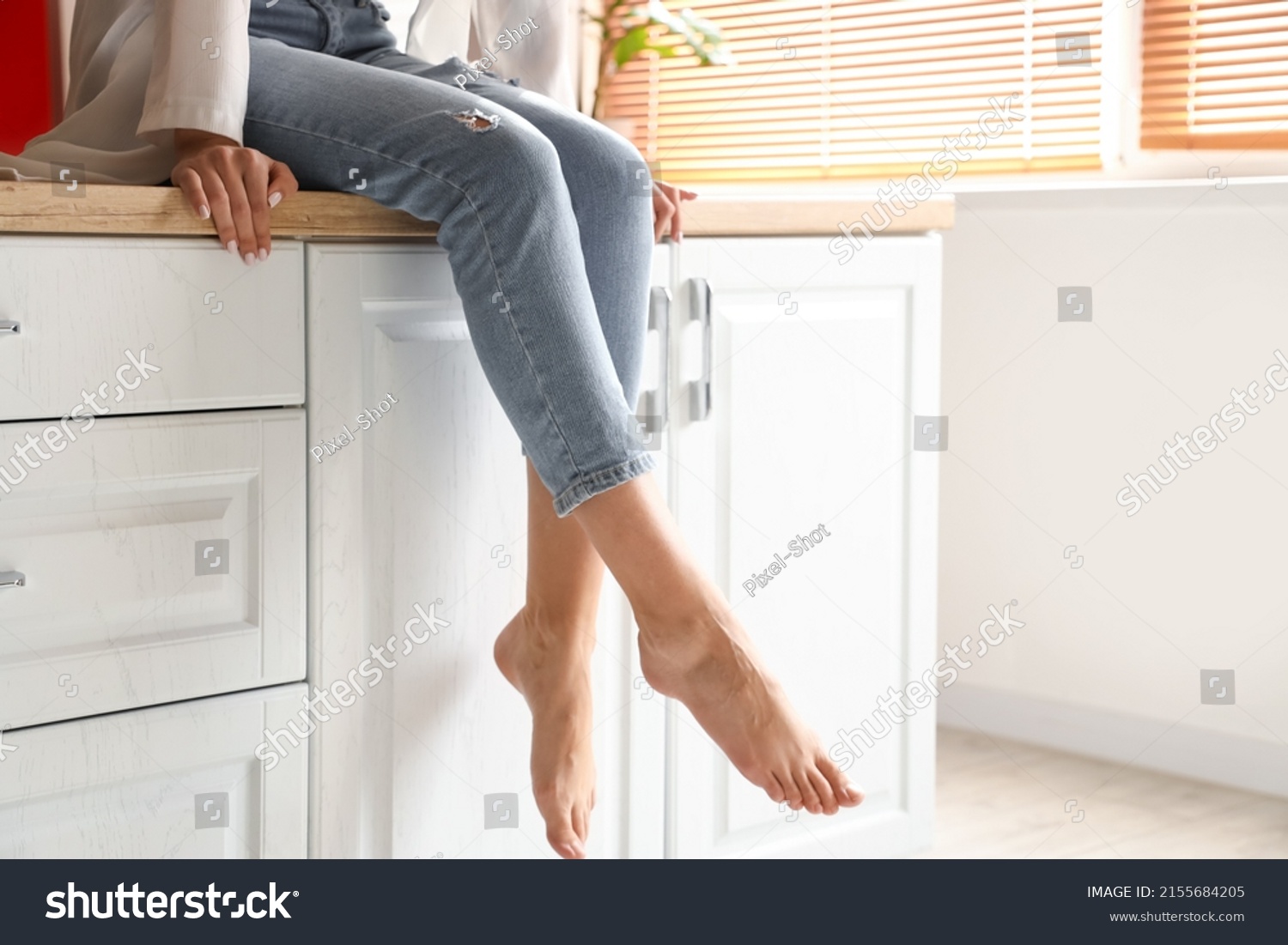 Barefoot Woman Sitting On Counter Kitchen Stock Photo 2155684205 ...