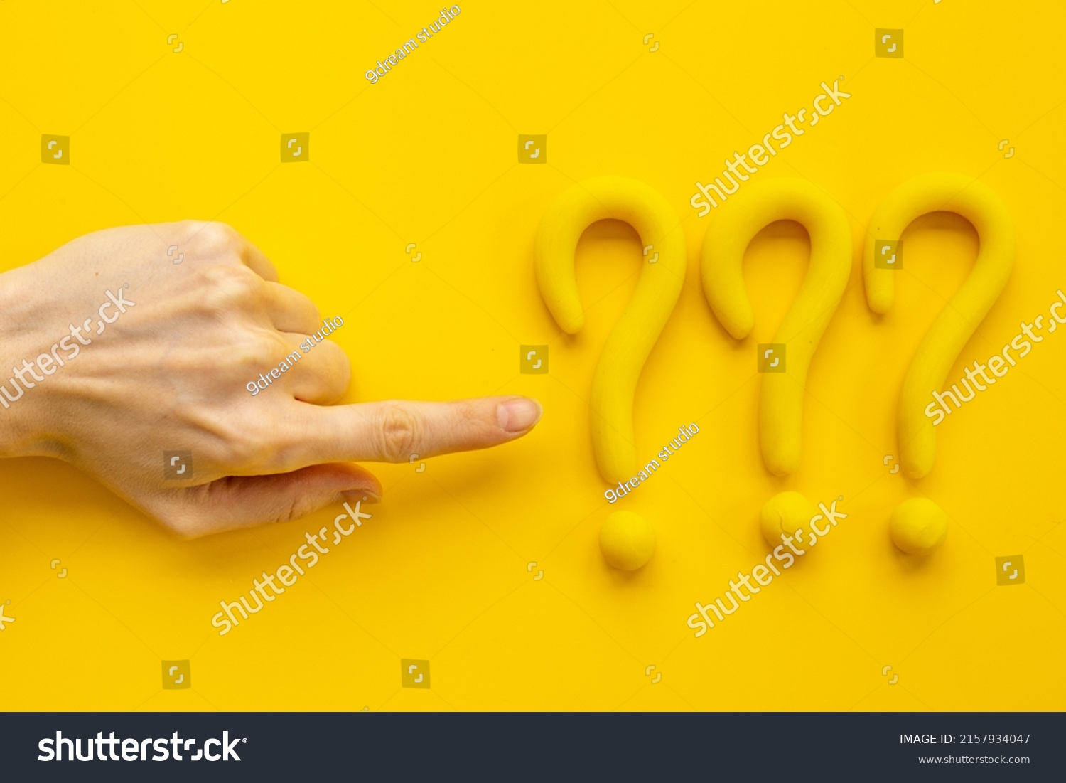 Hand Points Question Mark Sign Solving Stock Photo 2157934047