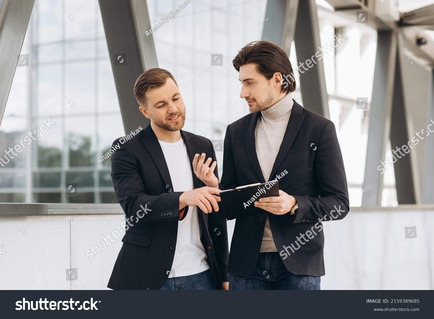 Two Happy Businessmen Colleagues Talking Each Stock Photo 2159389685