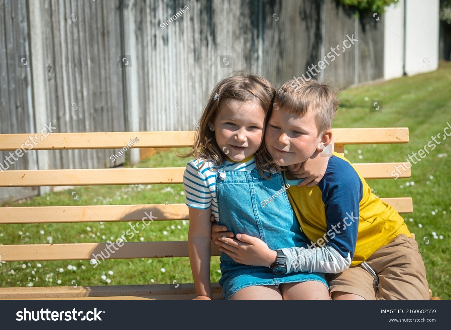 Two Happy Funny Kids Sitting On Stock Photo 2160682559 | Shutterstock