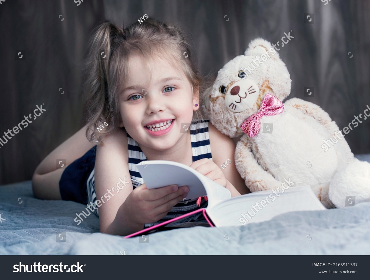 Child Girl Toy Reading Book Happy Stock Photo 2163911337 | Shutterstock