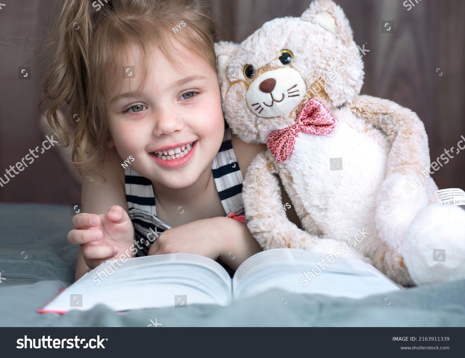 Child Girl Toy Reading Book Happy Stock Photo 2163911339 | Shutterstock