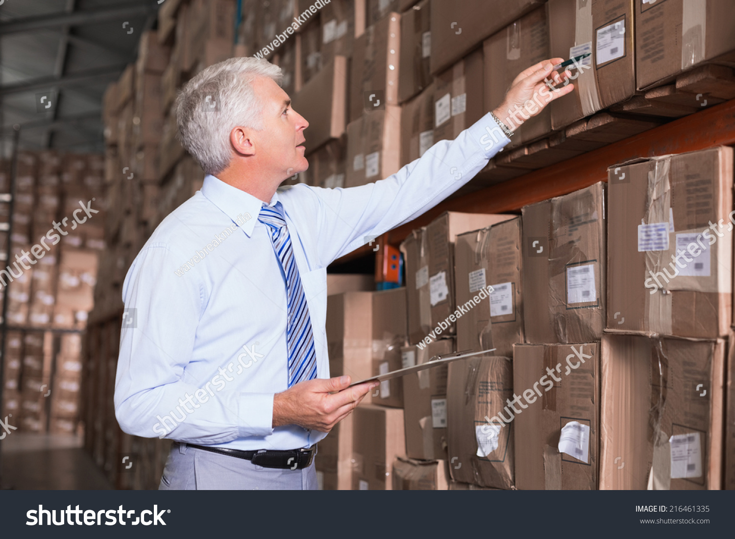 Warehouse Manager Checking His Inventory Large Stock Photo 216461335 ...