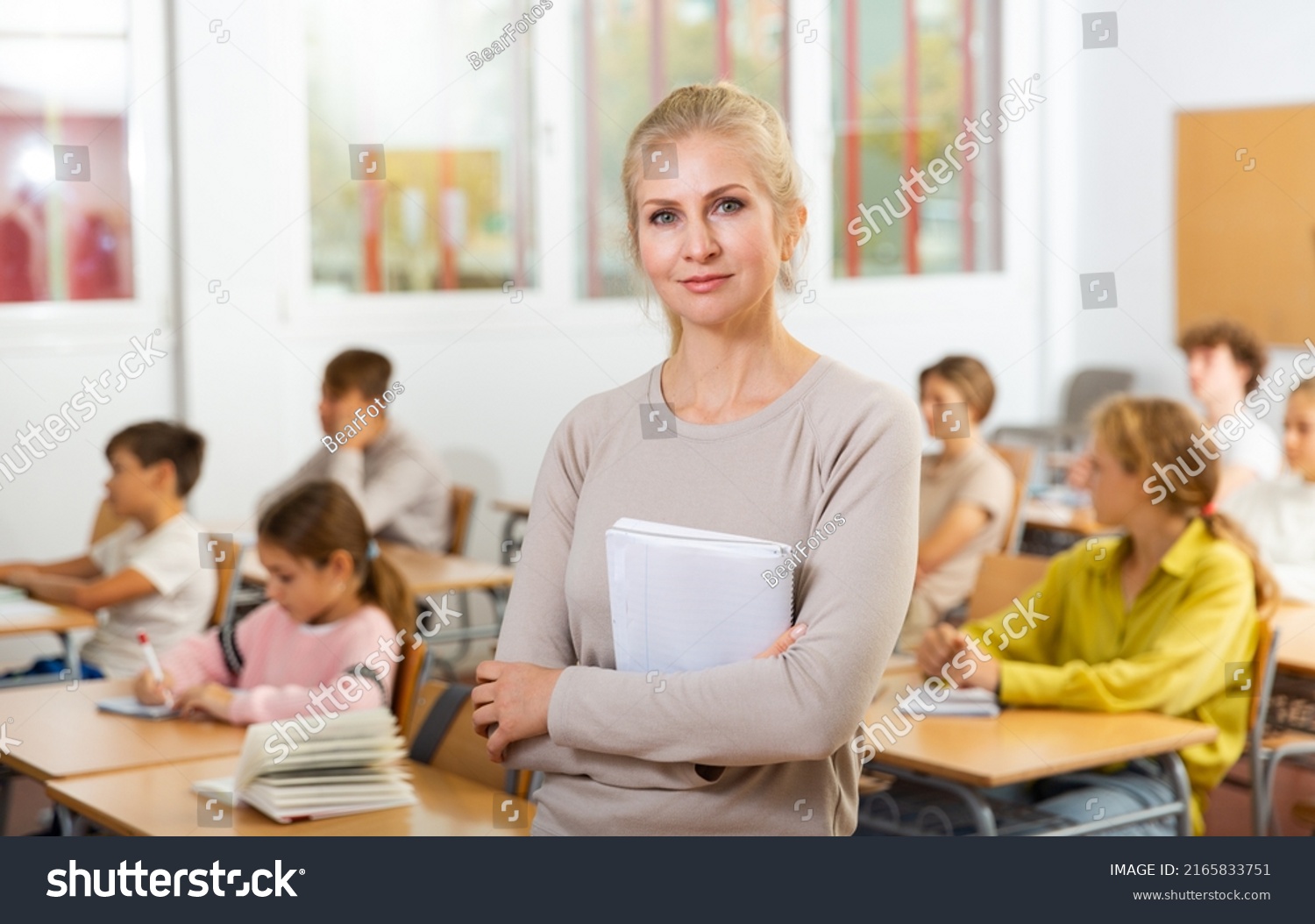 Waistup Portrait Female Teacher Standing Classroom Stock Photo ...