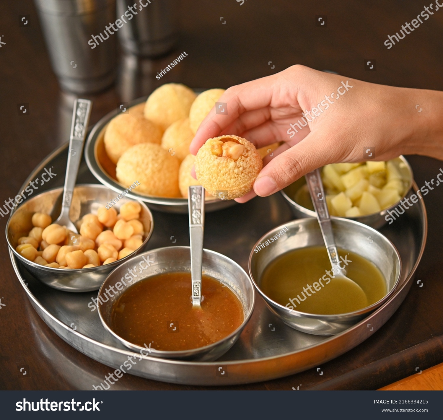 Womans Hand Holding Indian Food View Stock Photo 2166334215 | Shutterstock