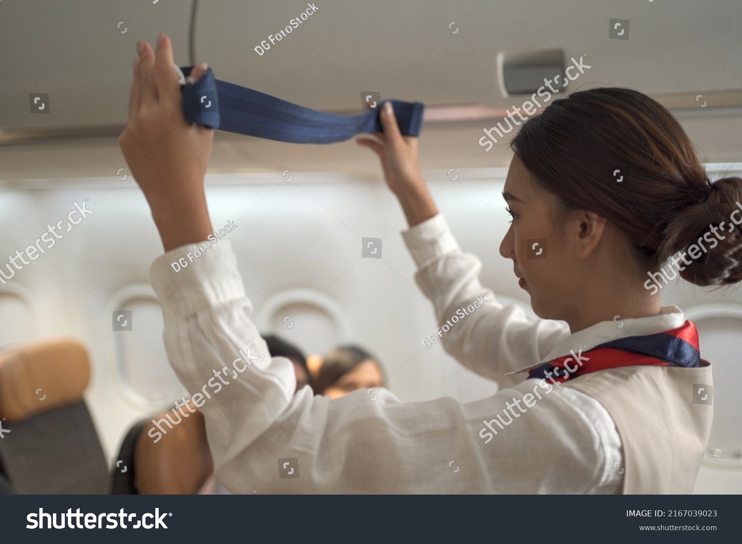 Beautiful Asian Airline Flight Attendance Demonstrates Stock Photo ...