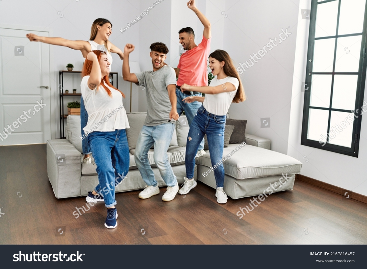 Group Young Friends Smiling Happy Dancing Stock Photo 2167816457 ...