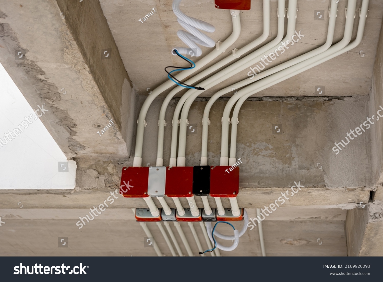 Red Electrical Junction Box Wiring Pipes Stock Photo 2169920093   Stock Photo Red Electrical Junction Box And Wiring Pipes On House Ceiling During Construction 2169920093 