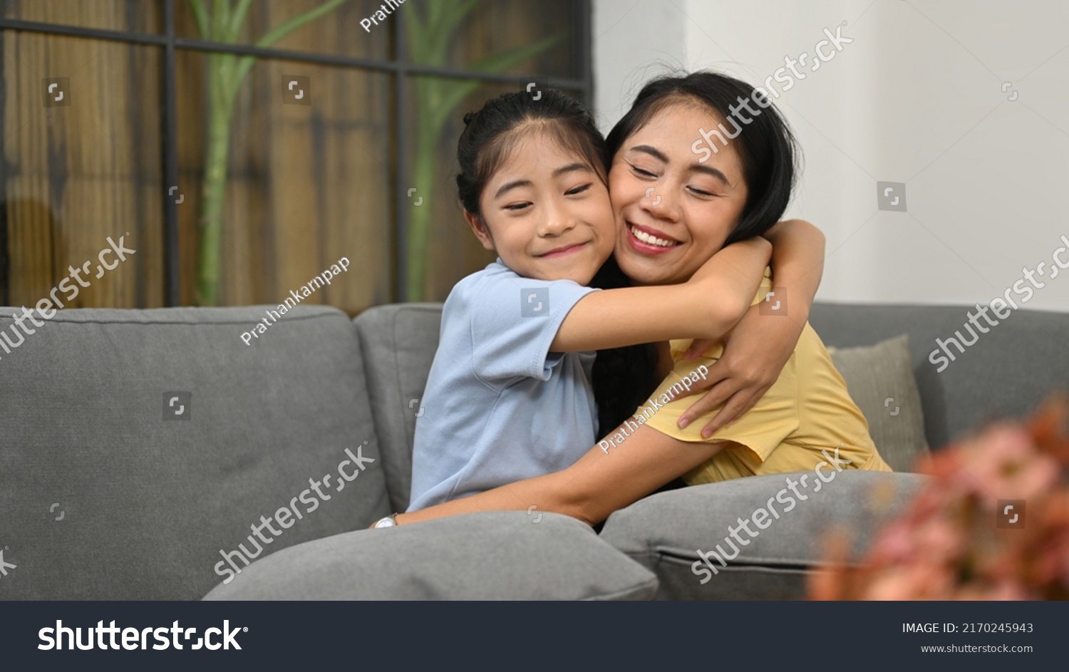 Cute Preteen Asian Girl Cuddling Her Stock Photo 2170245943 | Shutterstock