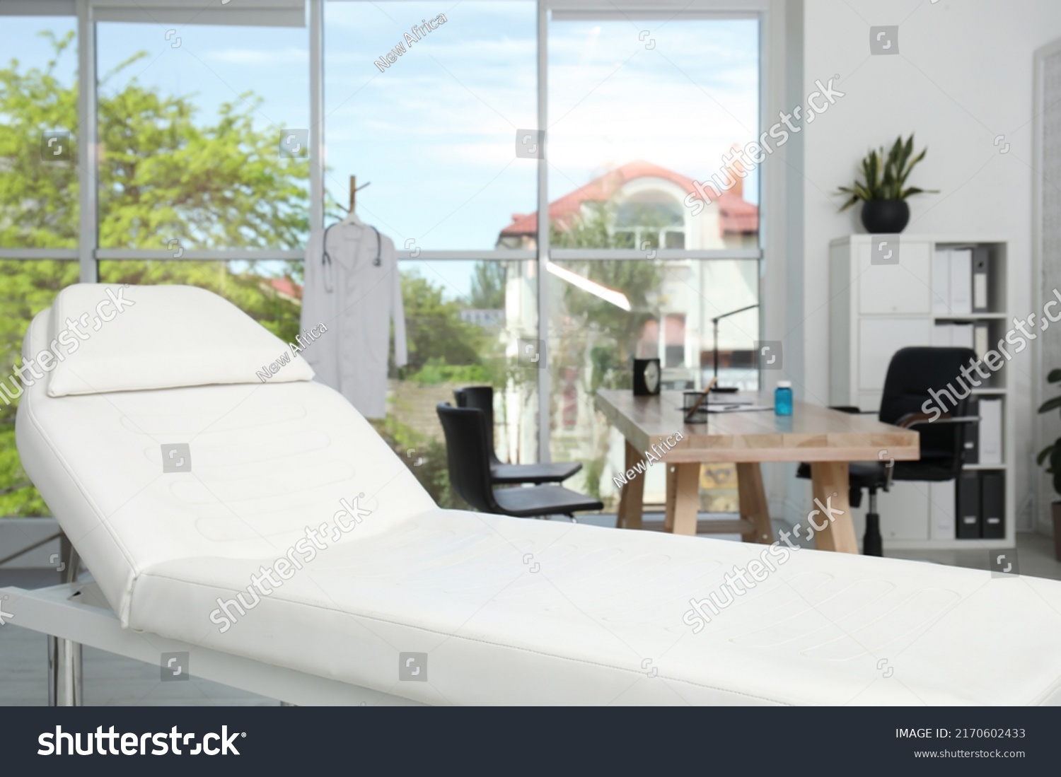 Modern Examination Table Medical Office Interior Stock Photo 2170602433   Stock Photo Modern Examination Table In Medical Office Interior Design 2170602433 