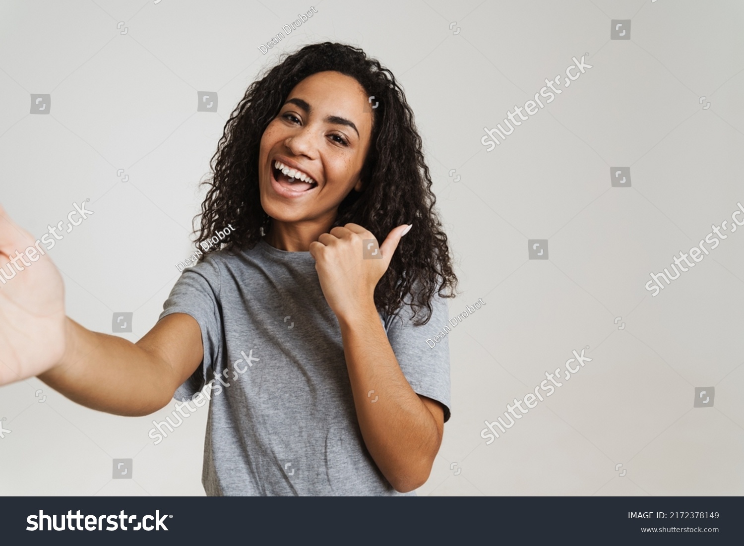 Young Black Woman Pointing Finger Aside Stock Photo 2172378149 ...